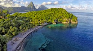 One free night at a unique St Lucian resort, where all rooms have the fourth wall open to the views of the Pitons<place>Jade Mountain</place><fomo>32</fomo>